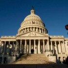 Man-Walks-by-US-Capitol-Building