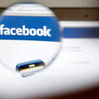130515_facebook_magnifying_glass_screen_reu_605