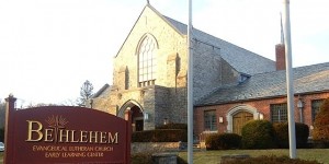 church exterior front with sign