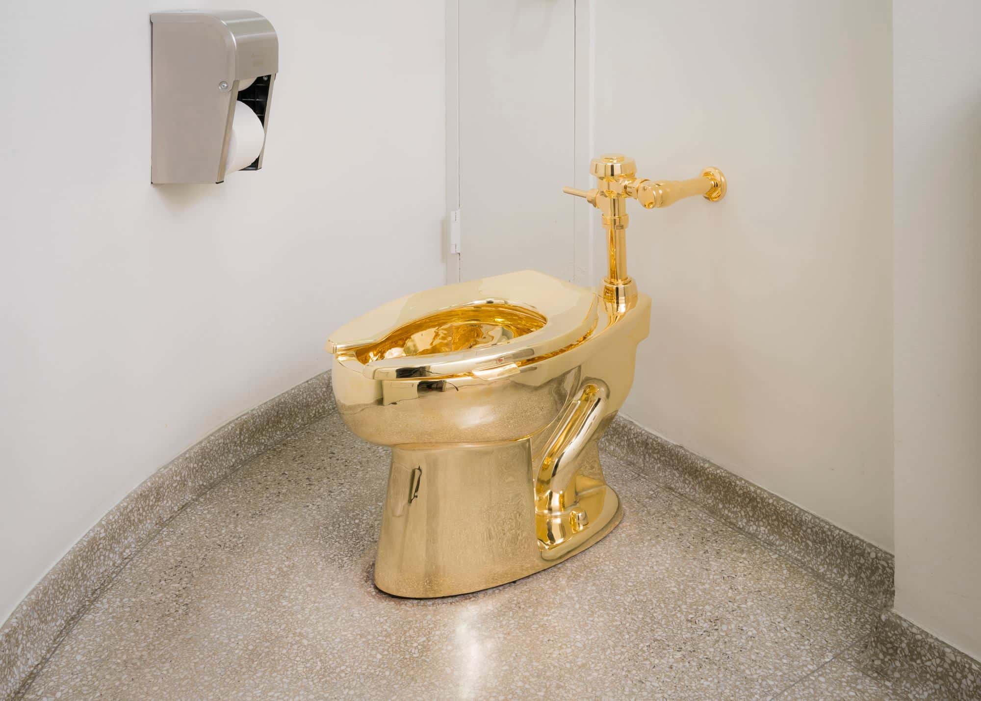 "Golden Toilet" by Maurizio Cattelan retrospective at the Guggenheim