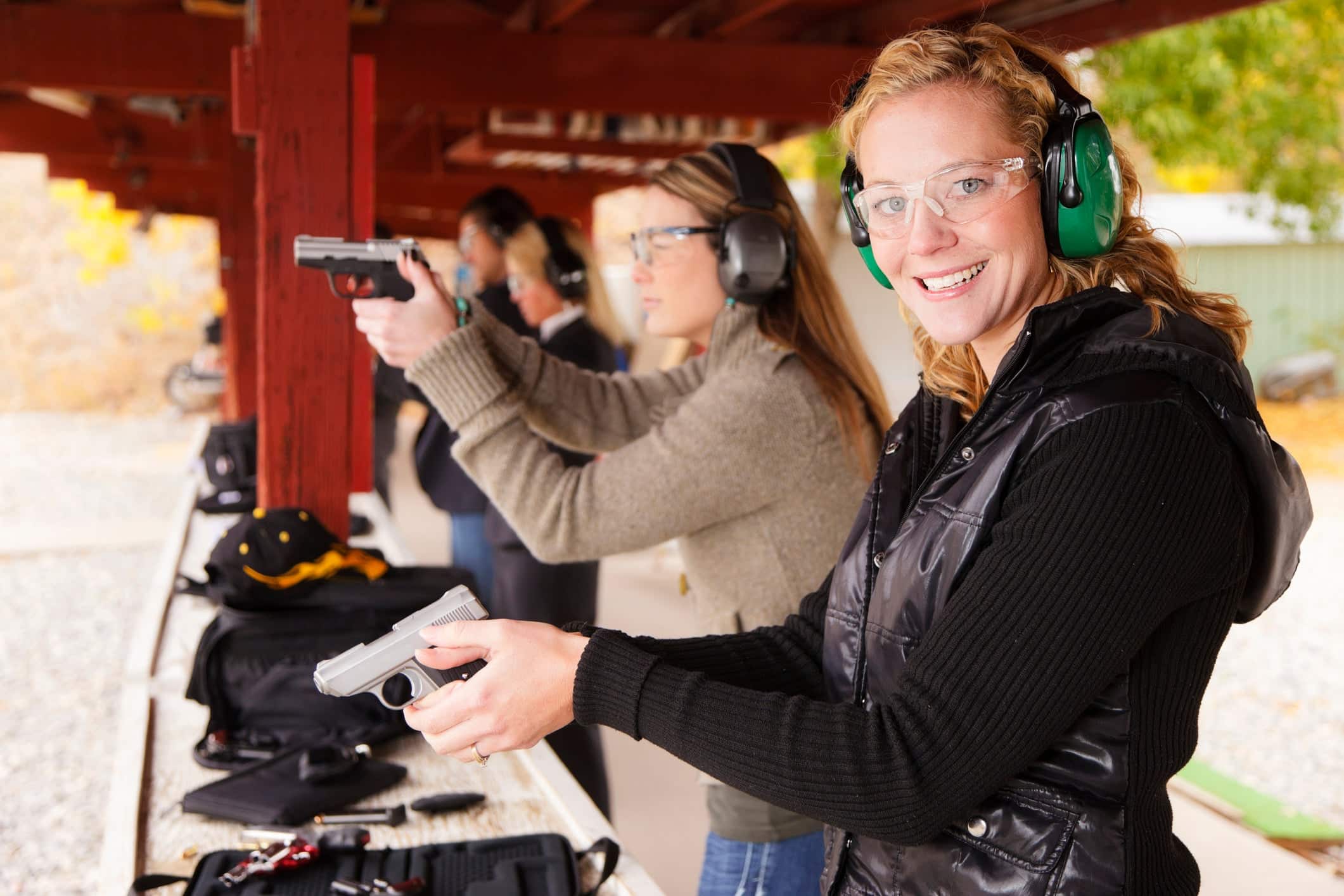 gun range women target practice firearms handgun pistol shoot shot show getty 414389908